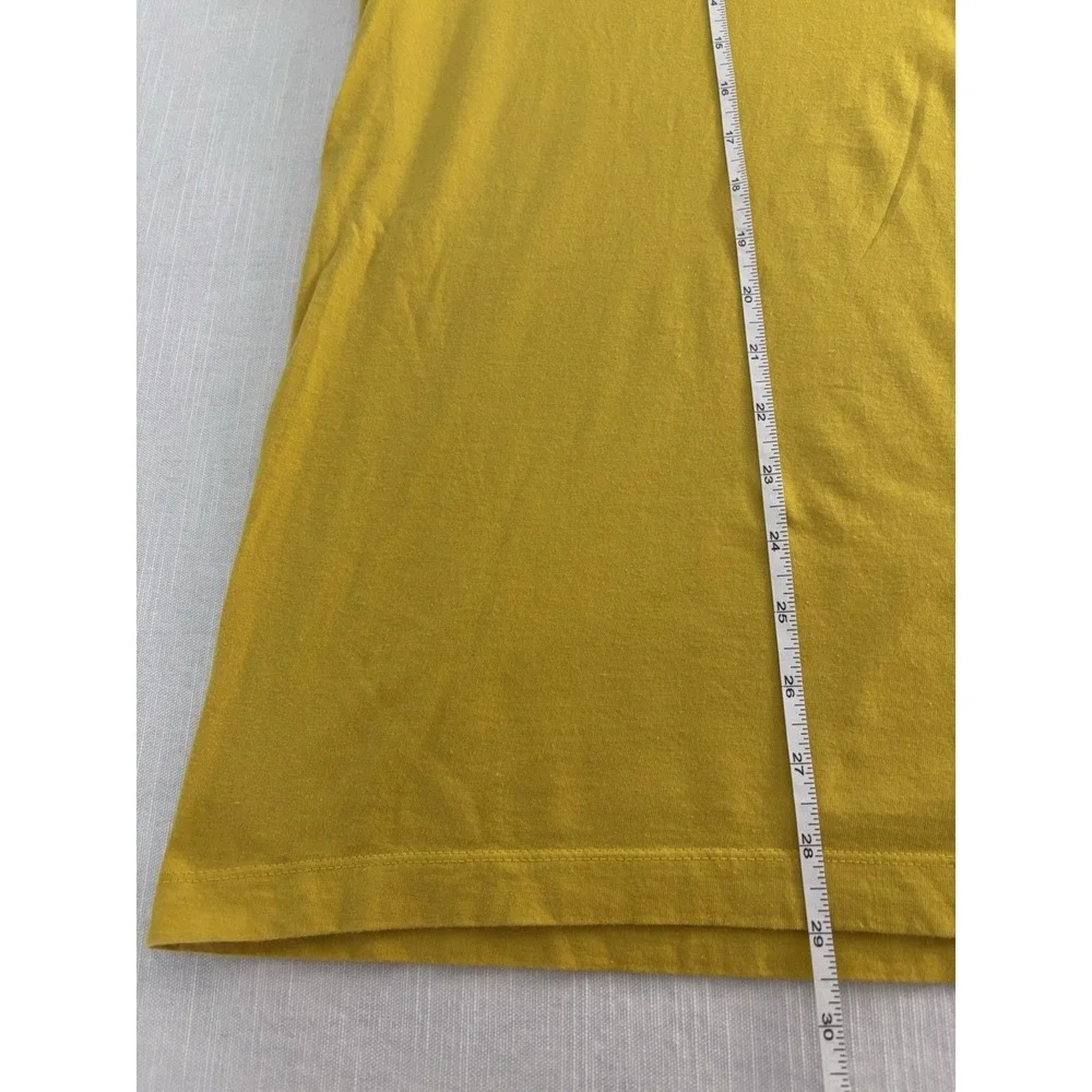 The Nike Cartoon Tee Mustard Yellow Size XXL graphic - Just Do It.